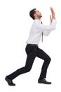 Businessman standing with bent legs and pushing Royalty Free Stock Photo