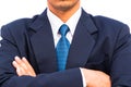 Businessman standing with closed posture