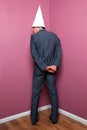 Businessman standing in the corner Royalty Free Stock Photo