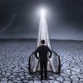 Businessman standing by the escalator on dried land Royalty Free Stock Photo