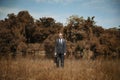 Businessman Standing Field Brown Grass Concept