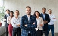 Businessman Standing In Front Of His Business Team In Office Royalty Free Stock Photo