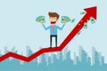 Businessman standing on growth graph and holding money. Success concept.