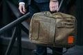 Businessman standing and holding a briefcase in hand working with confidence Royalty Free Stock Photo