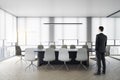 Businessman standing luxury conference room Royalty Free Stock Photo