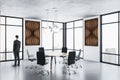 Businessman standing in meeting room Royalty Free Stock Photo