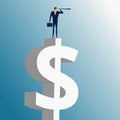 Businessman standing on money building and using telescope looking for success, opportunities, future business trends. Royalty Free Stock Photo