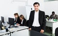 Businessman standing in office Royalty Free Stock Photo