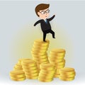 Businessman standing on a pile of gold coins Royalty Free Stock Photo