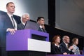 Businessman standing at podium Royalty Free Stock Photo