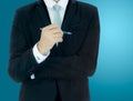 Businessman standing posture hand hold a pen isolated Royalty Free Stock Photo