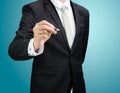 Businessman standing posture hand hold a pen isolated Royalty Free Stock Photo