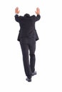 Businessman standing and pushing with hands Royalty Free Stock Photo