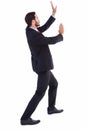 Businessman standing and pushing up Royalty Free Stock Photo