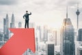 Businessman standing on red arrow and look into the distance Royalty Free Stock Photo