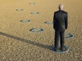 Businessman Standing In Ring At Barren Landscape