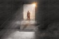 Businessman standing on staircase,to looking door with opportunity of sun light,concept leader and vision,new idea,success,risk, Royalty Free Stock Photo