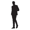 Businessman standing in suit, isolated vector silhouette. Business people