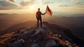 Businessman standing top of mountain and hand holding winner orange flag, Back view shot, Success concept