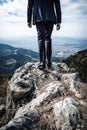 Businessman is standing on the top of the mountain for successful career concept Royalty Free Stock Photo