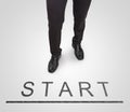 Businessman standing wearing court shoes on start(begin) line. Royalty Free Stock Photo