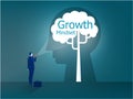 Businessman stands with a flashlight to growth mindset on head human concept vector Royalty Free Stock Photo