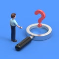 businessman stands in front of a question mark in a magnifying glass, looking for a solution or an answer to a question Royalty Free Stock Photo