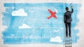 A businessman stands on a stepladder and draws with a paint roller a blue sky for a cartoon red airplane to fly in.