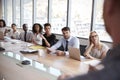 Businessman Stands To Address Meeting Around Board Table Royalty Free Stock Photo