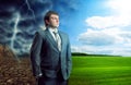 Businessman staying against bad and good weather