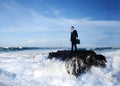 Businessman Staying Alone on the Island Royalty Free Stock Photo