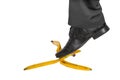 Businessman stepping on banana peel - business risk concept Royalty Free Stock Photo