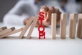 Businessman Stopping The Effect Of Domino Royalty Free Stock Photo