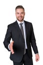 Businessman stretching out hand to shake, isolated over white ba Royalty Free Stock Photo