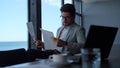 Businessman studying documents papers in office. Manager looking document data Royalty Free Stock Photo