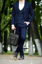 Businessman style. Men style. Man in custom tailored business suit posing outdoors