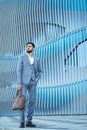 Businessman style. Men style. Man in custom tailored business suit posing outdoors