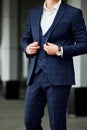 Businessman style. Men style. Man in custom tailored business suit posing outdoors