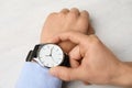 Businessman with stylish wrist watch at table Royalty Free Stock Photo
