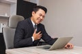 Businessman is suffering heart disease at workplace