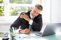 Businessman Suffering From Shoulder Pain