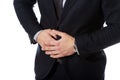 Businessman suffering from stomach pain.
