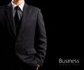Businessman in suit on black background Royalty Free Stock Photo