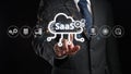 Businessman Interacting with Digital SaaS Concept in Modern Office Environment, Exploring Software as a Service Royalty Free Stock Photo