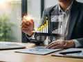 Businessman interacting with virtual financial chart showing business growth and data analysis dashboard Royalty Free Stock Photo