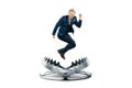 A businessman in a suit jumps into a large metal bear trap. Concept of problem solving, failure, crisis, mixed media Royalty Free Stock Photo