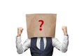Businessman in suit and paper bag with question isolated on white background Royalty Free Stock Photo