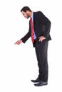 Businessman in suit pointing finger