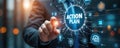 Businessman in suit points to virtual screen with Action Plan strategy concept. Man interacts with digital interface displaying Royalty Free Stock Photo