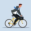 Businessman in suit rushing to job on bicycle Royalty Free Stock Photo